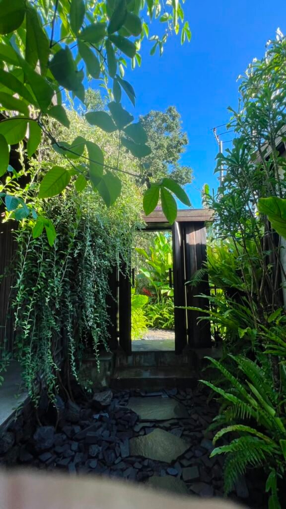Entrance path leading to the private hot spring pool in Kintamani