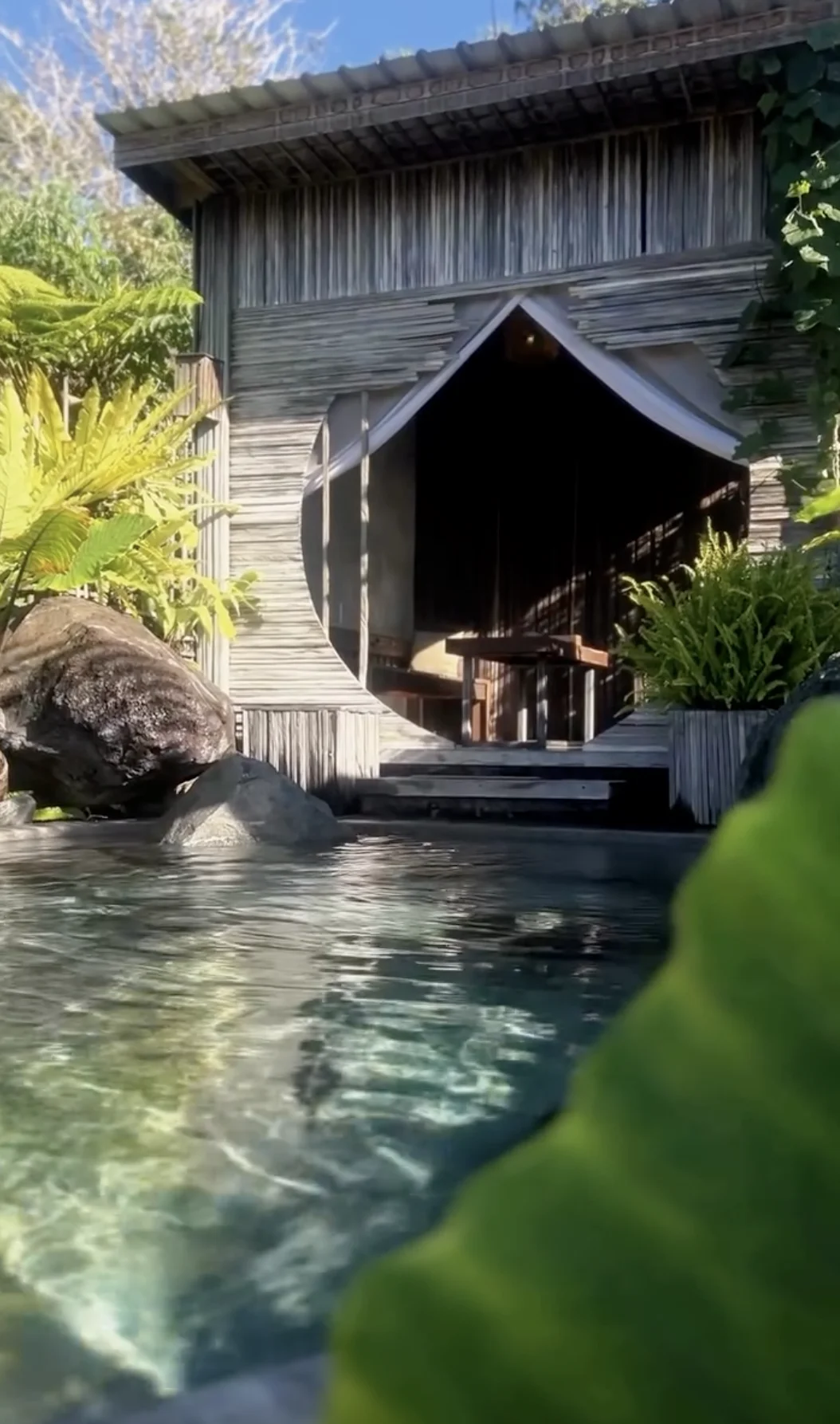 Private hot spring pool at Onsen Bali with a view of Lake Batur
